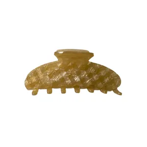 Pince à cheveux en acétate ambré avec motif géométrique diamanté et prise solide