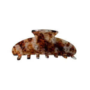 Classic tortoise shell acetate hair claw clip with elegant marble pattern for women