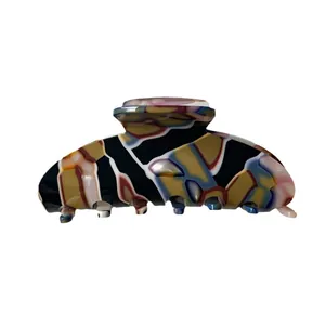 Minimalist geometric abstract hair claw clip with colorful artistic retro pattern