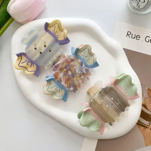 Three-piece rhinestone candy-shaped hair claws in colorful acetate for elegant styling
