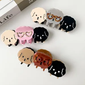 Cute acetate puppy dog hair claws in multiple colors including beige and tortoise shell