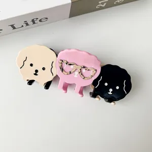 Set of three cute cartoon dog hair claws in cream, pink, and black acetate finish