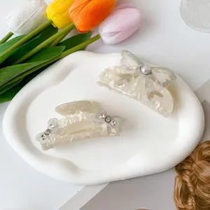 Lolita Haarklammer mit Schleife, Perlen und Strasssteinen in Perlmutteffekt-Creme