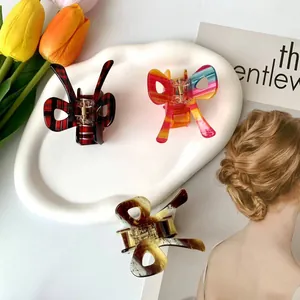 Pinces à cheveux nœud en acétate coloré avec motifs arc-en-ciel, carreaux et ambre
