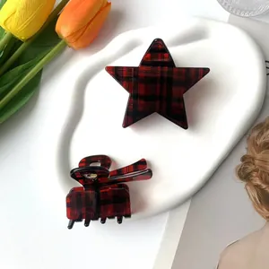 Red and black plaid star-shaped hair claw clip and rectangular hair accessory set