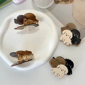 Set di mollette per capelli in acetato con tre cagnolini in marrone e beige