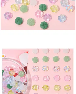 Macro detail of colorful four-leaf clover resin beads for DIY jewelry making accessories