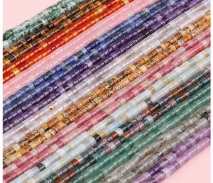 Macro view of polished square natural stone beads in various colorful gemstone materials