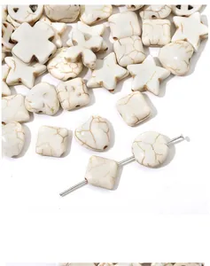 Various white howlite stone beads in star heart and cross shapes for DIY jewelry making
