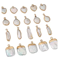Macro view showing various shapes of natural baroque pearls with gold plated edges for DIY jewelry