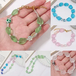 Frosted irregular glass bead bracelets and phone charms in assorted pastel colors