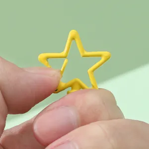 Yellow star-shaped alloy keychain accessory with functional side opening clasp