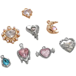 Set of 8 heart and moon shaped alloy pendants with colorful rhinestones and pearls