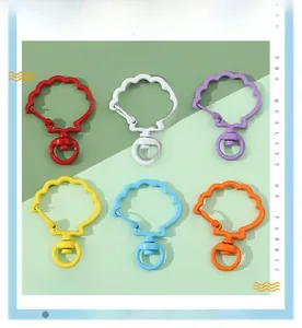 Colorful shell-shaped lobster clasps with rotating rings in six high-saturation candy colors