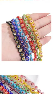 Close-up of 6-8mm colorful millefiori glass beads with floral patterns for DIY jewelry