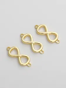 Detailed macro view of 14K gold plated infinity link connectors for DIY jewelry making