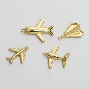 Set of four 14K gold-plated airplane and paper plane pendants for DIY jewelry making