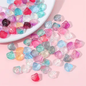 Detailed view of colorful iridescent scallop beads for DIY jewelry and hair accessories