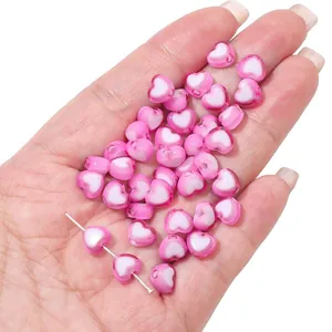 DIY acrylic heart beads in pink and white color combination for jewelry making