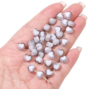 Two-tone acrylic heart beads with white core and clear edges for DIY jewelry making