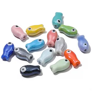 Colorful ceramic fish beads with glossy finish and pre-drilled holes for DIY jewelry