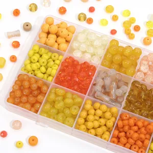 Set di perle fai-da-te in vetro arancione e giallo in scatola trasparente portaoggetti