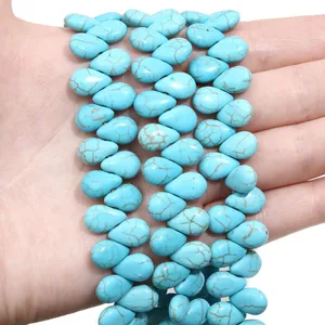 Teardrop-shaped synthetic turquoise beads in sky blue with brown veined texture