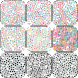 Selection of acrylic glow beads for DIY jewelry with alphabet and heart patterns