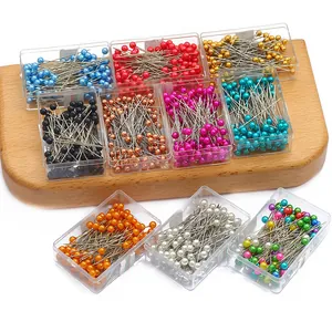 Bunte Perlkopfstecknadeln in transparenten Kunststoffboxen für DIY-Schmuck und Handwerk