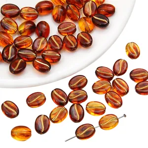 Amber acrylic coffee bean beads with gold details for DIY jewelry making and phone chains