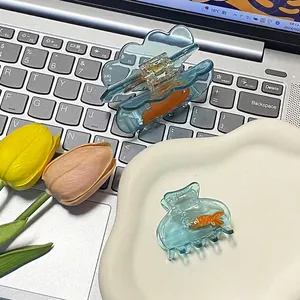 Blue translucent goldfish hair claw clip set with creative water bag design