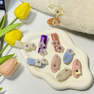 Set di fermagli per capelli colorati in resina con fiori di strass scintillanti