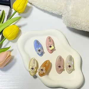 Set di fermagli per capelli a fiori in colori pastello con cristalli scintillanti