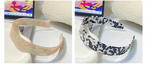 Close-up of retro checkered hairbands with marble and polka dot textures for women