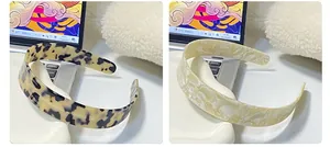 Detail view of tortoiseshell and marble texture patterns on minimalist hair bands