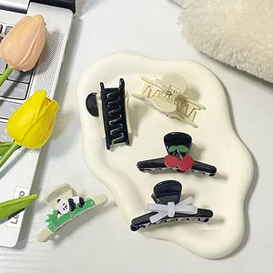 Cute panda hair clip set featuring mini shark clips with cherry and bow accents