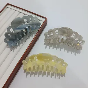 Three-piece large acetate crown hair claws set with marble pattern and wavy edges