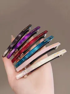 Ensemble de barrettes à cheveux en acétate coloré avec gravure dorée La France