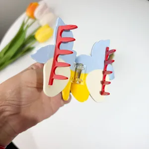 Pince à cheveux papillon en acétate au design coloré avec mécanisme à ressort robuste