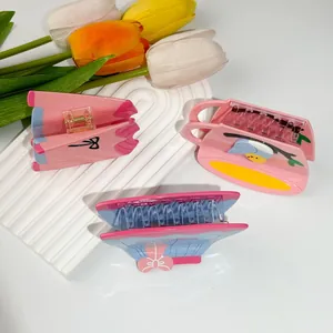Set of three acetate shark hair clips with pink bow and cartoon bird cup designs