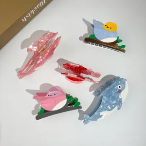 5-piece acetate hair claw clip set with whale, bird and dolphin animal shapes