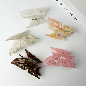 5-piece set of acetate butterfly hair claws with marble texture and pearl finish