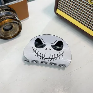 Detail view of Jack Skellington acrylic hair claw clip with glossy white finish