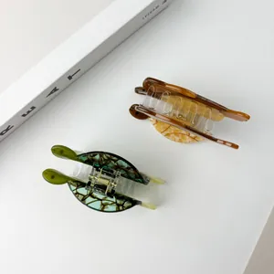 Pinces à cheveux en acétate en forme de tortue, coloris écaille et vert marin