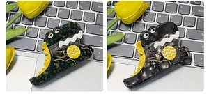 Detail view of acetate dinosaur hair claws in tortoiseshell and marble patterns
