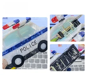 Detail view of police car hair claw clip showing acetate texture and metal spring