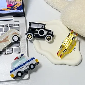 Handmade acetate car hair claws featuring vintage police car and yellow taxi designs