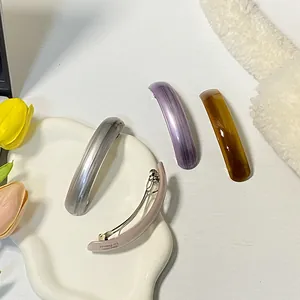 Chic set of four striped and solid acetate spring hair barrettes in various elegant colors