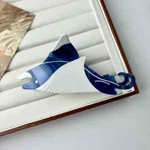 Blue and white marble acetate ray shark hair claw clip for elegant ocean-inspired hairstyles