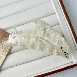 French style pearl white dolphin hair claw clip with checkered pattern and starfish detail